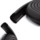 Roving Cove Slim-Fit edge protector on a wooden table corner for safe toddler play.