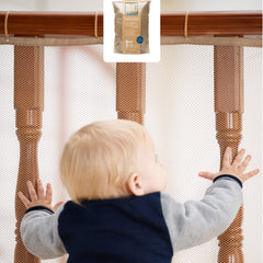 Roving Cove stair banister guard installed on stairs for safe baby proofing with clear visibility