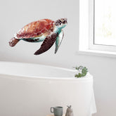 RoyoLam sea turtle wall decal on a white nursery wall