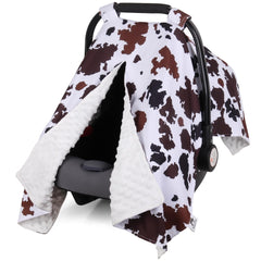 Rquite car seat cover protects from sun and wind while keeping baby cozy.