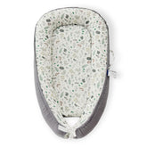 RYXTHALA premium muslin baby lounger folded for travel convenience.