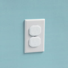 Safety 1st Secure Press plug protectors kit shown in packaging, easy to install across rooms for consistent safety.