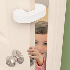 Safety 1st Finger Pinch Guard hanging on a doorknob for quick access.