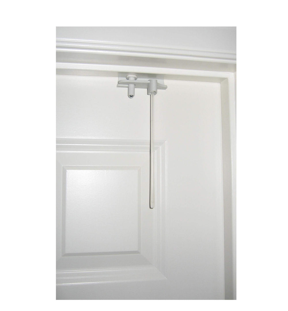 Safety Innovations deluxe top door lock installed on door for added child safety.