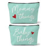 Sahjzk mommy and baby pouches green set flatlay for organized travel.