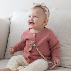 SAMiGO pacifier clips are lightweight and flexible for tiny little hands.