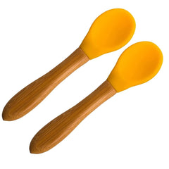 SAN SERO bamboo baby spoon with soft tip in yellow for safe self-feeding.