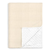 Sandjest Baby Blanket muslin side offers breathable crib comfort.
