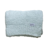 Saranoni Bamboni blanket texture closeup highlighting velvety softness for cozy evenings