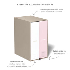 Savor I Baby Deluxe Box collection drawers organize tiny keepsakes like first outfits and tiny shoes.