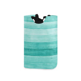 Senya large storage basket with handles in teal for easy transport.