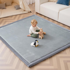 SEPARO baby play mat with plush surface supports comfortable tummy time on hard floors.
