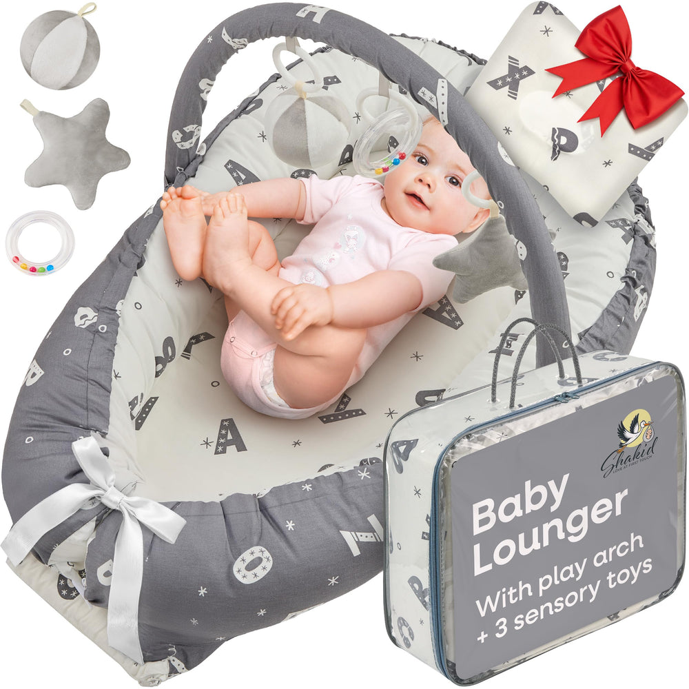 Shakid portable baby lounger in grey abc for home or travel comfort