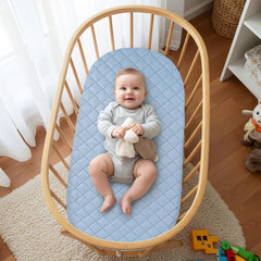 SheSeek bassinet waterproof layer visible, protecting mattress from leaks.