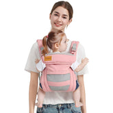 Shiaon baby carrier with breathable mesh showing pink fabric and close fit for newborn comfort