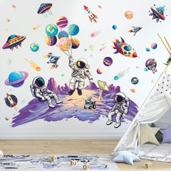 SHUCHING planet and rocket decal adds celestial charm to nursery decor.