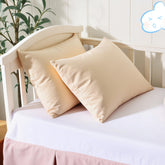 Shunjie.Home 2-pack toddler pillow protectors on bed for quick cleanup
