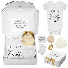 Shyyween pregnancy announcement gift set bundle showing bodysuit, card, socks, ribbon, and sign