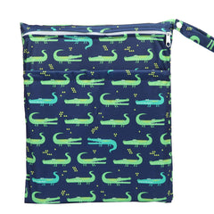 Sigzagor wet bag with green crocodiles design holds wet diapers and keeps items organized