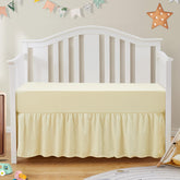 SiinvdaBZX ivory ruffled crib skirt conceals under-crib storage