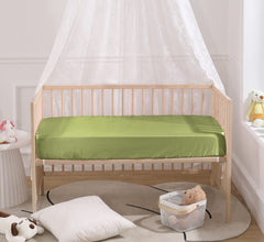 SiinvdaBZX satin crib sheet on a standard crib demonstrates universal fit.