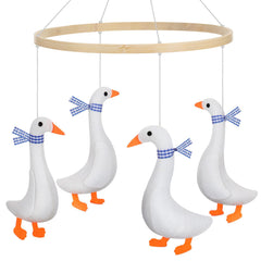 Silipull goose baby mobile hanging above crib for soothing visual play