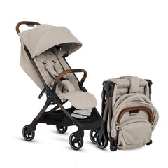 Silver Cross Clic compact travel stroller shown in a city setting for busy families.