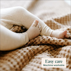 Simka Rose blanket shown on a stroller for outings