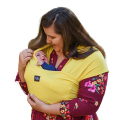 Simply Essential Solutions baby wrap in yellow shows soft stretchy cotton for comfortable carrying