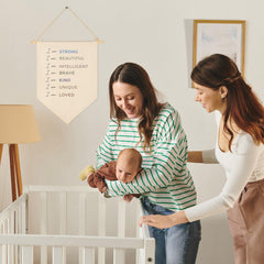 Sioial canvas hanging flag in beige decor for baby room and reading spaces.