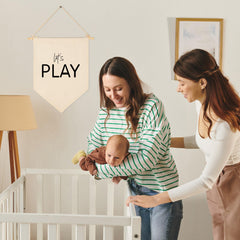 Sioial Playroom canvas banner decorates walls with durable fabric for kids' rooms.