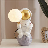 Skyblaze Astronaut Table Lamp close-up highlights a playful resin figure for kids room decor