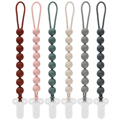 Slotic pacifier clip pack of six keeps pacifiers within reach on the go.