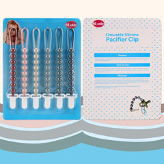 Slotic clip attached to baby clothing during errands.