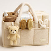 Smoochie diaper caddy organizer in full basket keeps nursery essentials accessible.
