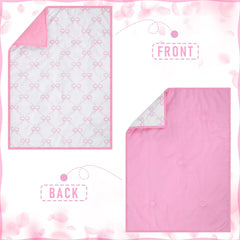 SmoothNovelty pink bow comforter provides gentle warmth for peaceful naps