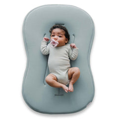 Snuggle Me Lounger Curve front view, cozy infant space for playtime.