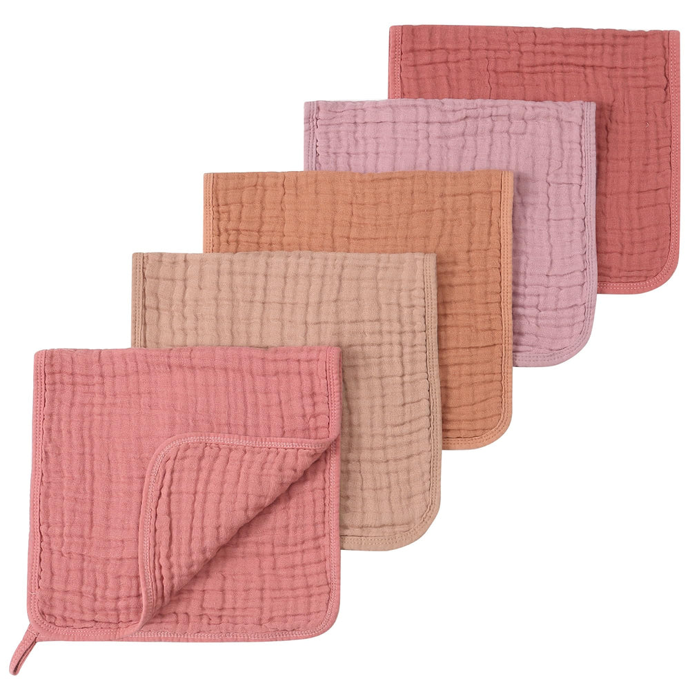 SnugOre 5 pack burp cloths showing soft muslin on newborn shoulders for gentle protection