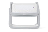 SnuzPod 4 Dove bedside bassinet setup showing compact, stylish design.