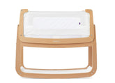 SnuzPod 4 rocking bassinet in natural finish with close night care