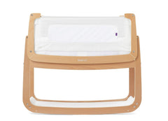 SnuzPod 4 rocking bassinet in natural finish with close night care