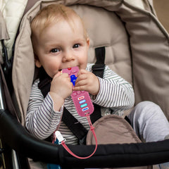 SOLIFEGOBLE black remote teether, side view showing textured buttons for gum soothing.