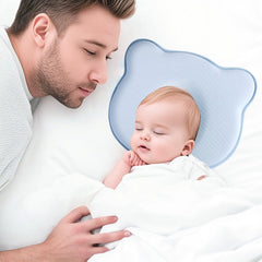 SOMKHA baby head support shown in a nursery setting