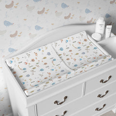 Sorrel + Fern farm animals pattern changing pad cover stays bright after washes.