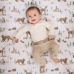 Sorrel + Fern fitted crib sheet with deep pockets for secure fit.