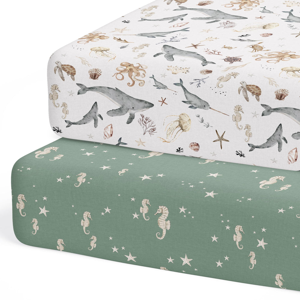 Sorrel + Fern Ocean Odyssey fitted sheet with a snug, slip-free crib fit.