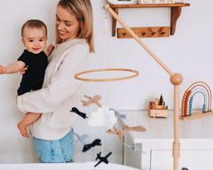 Sorrel and Fern sustainable felt birchwood mobile adds eco friendly style to bassinet décor