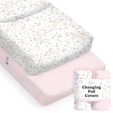 Sorrel + Fern Unicorn Blossom changing pad cover in action, silky cotton blend protects baby during changes.