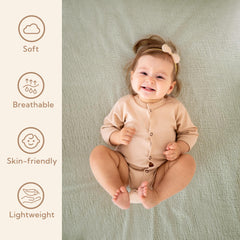 SOULFUL mist sage muslin crib sheet 28x52 adds subtle color to nursery.