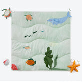 Spirich 9-in-1 tummy time mat closeup highlights the soft surface for gentle play.